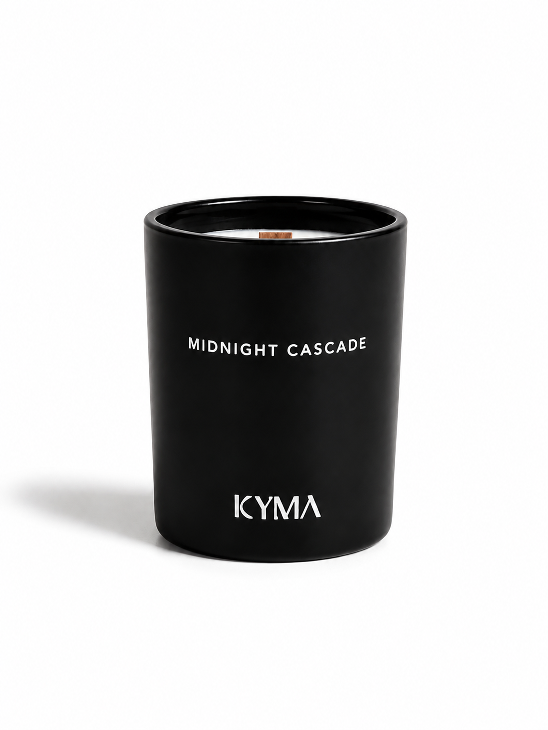Midnight Cascade soy candle in a matte black vessel by Kyma