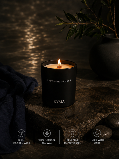 Hands lighting the Sapphire Ganges soy candle