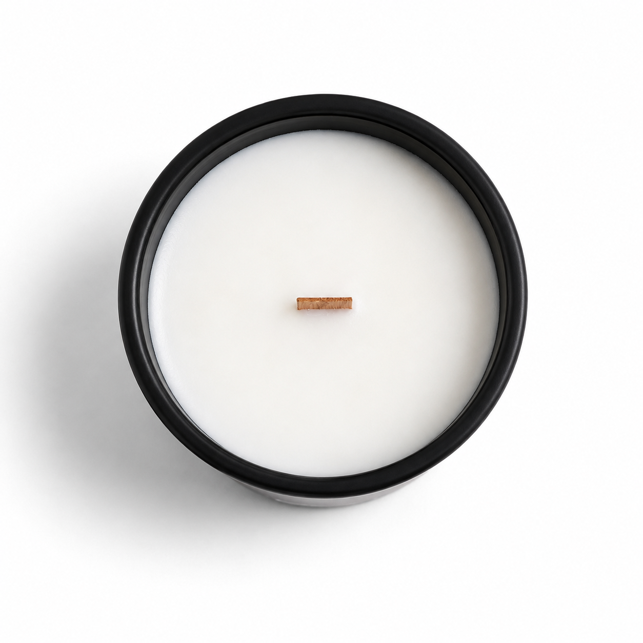 Top view of the Kyma soy candle showing its wooden wick